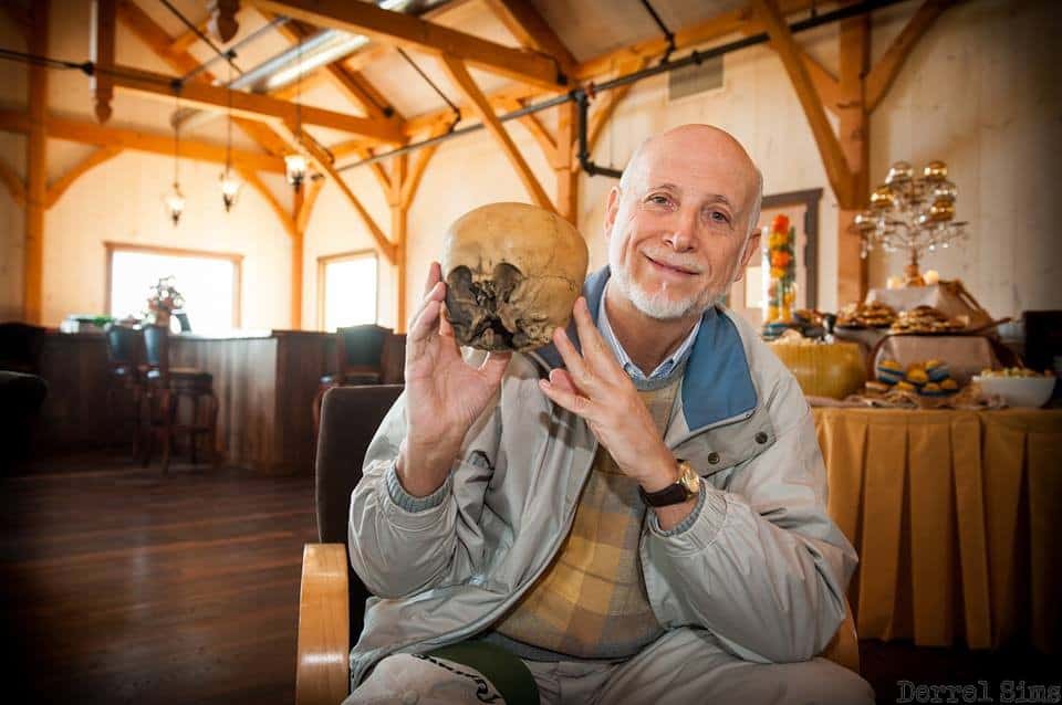 Researcher Lloyd Pye holding his famous Starchild Skull